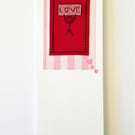 Stick man holding a Love sign cross stitch card