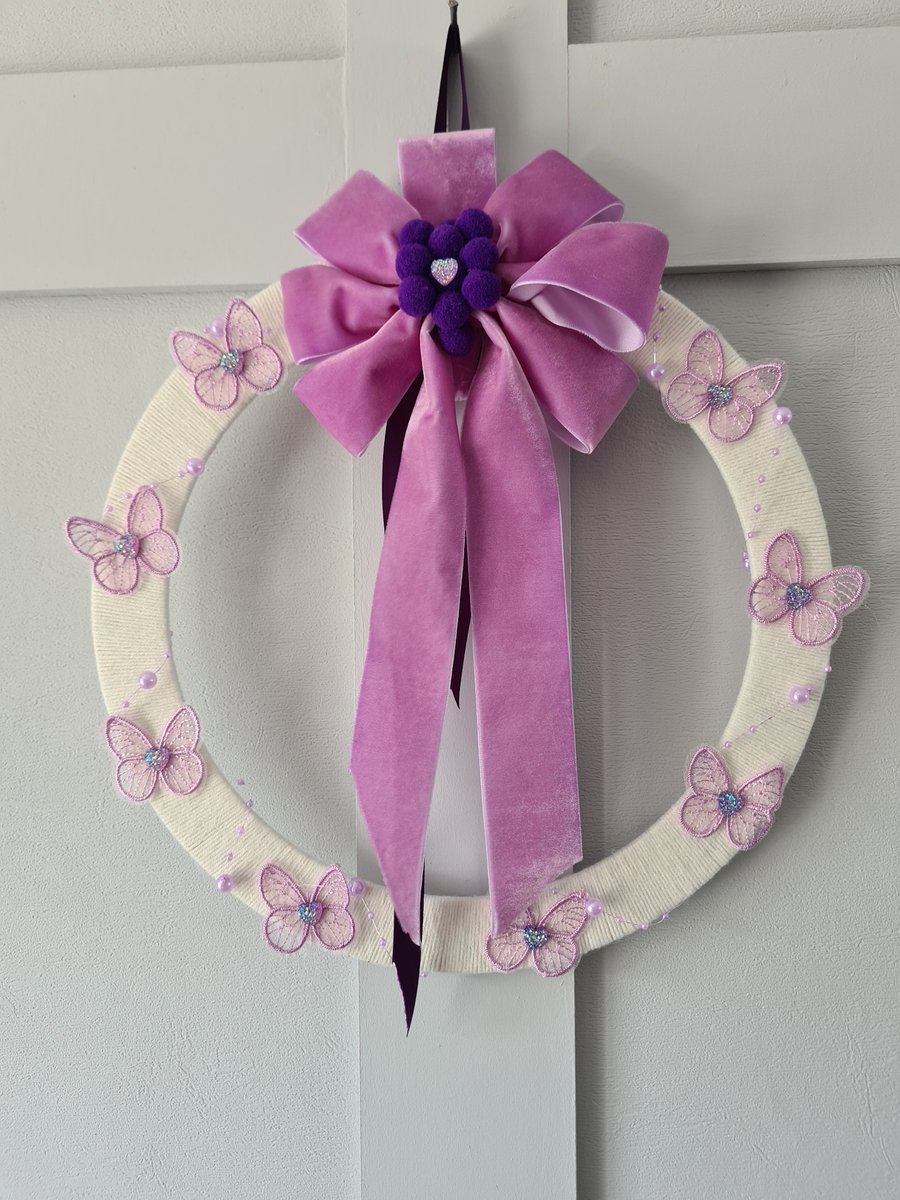 Yarn wrapped butterfly wreath