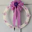 Yarn wrapped butterfly wreath