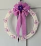Yarn wrapped butterfly wreath