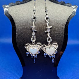 Silver drip hearts with barbed wire