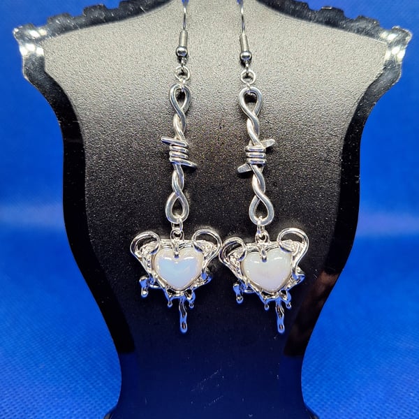 Silver drip hearts with barbed wire