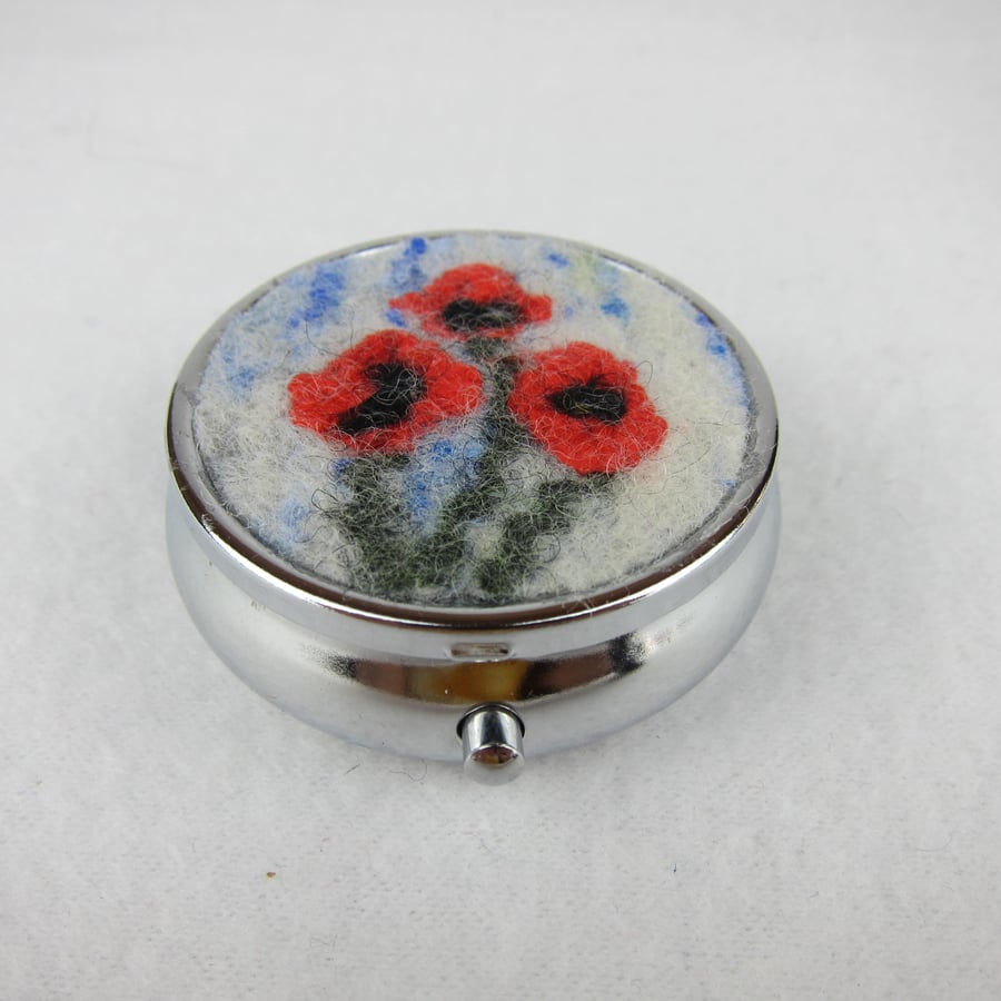 SALE - Round silver tone pill box with poppy decoration