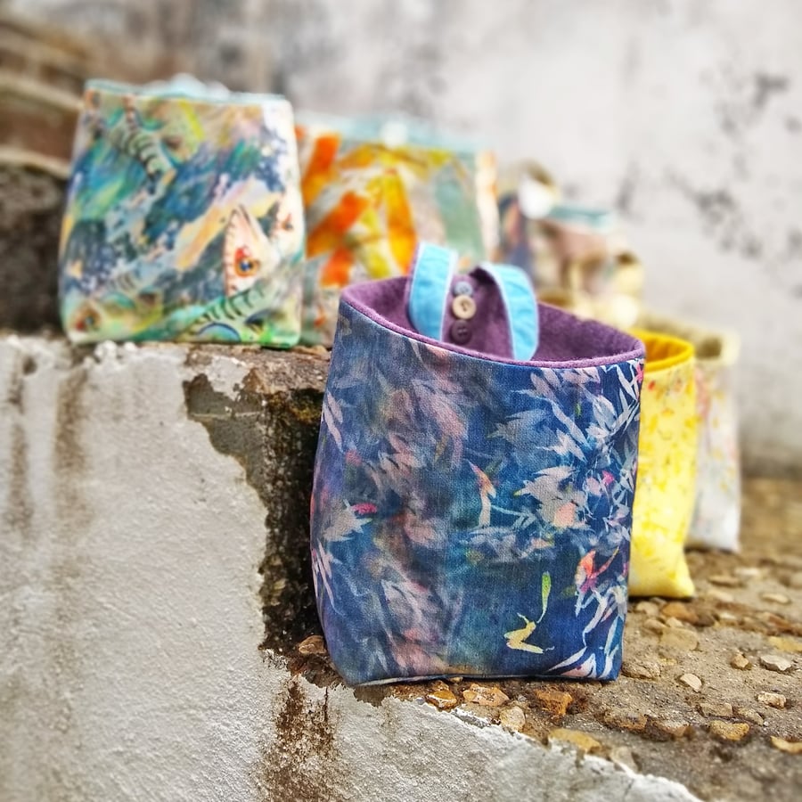 Floral design chenille and wool felt storage pouch with hanging loop