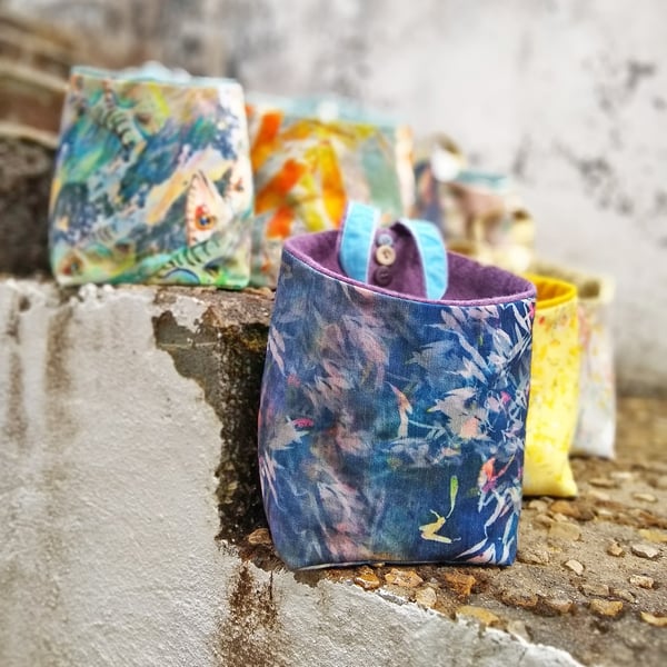 Floral design chenille and wool felt storage pouch with hanging loop