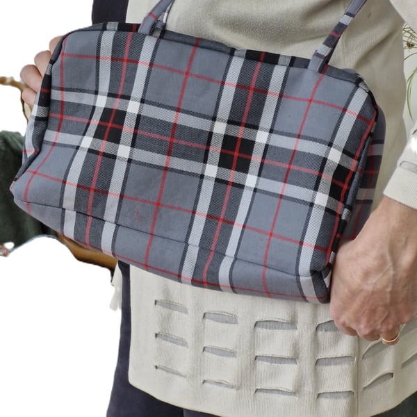 Spacious bowling bag with shoulder straps, key chain, charm tabs, zip & gusset