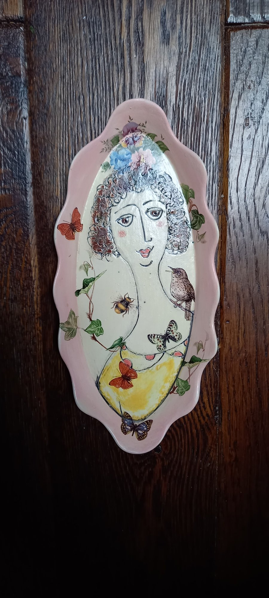 Figurative wall hanging .