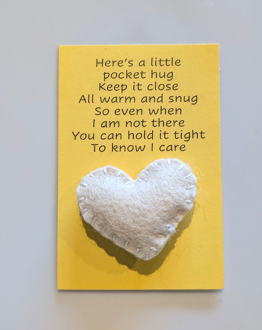 Handmade handsewn felt mini heart shaped pocket hug cream