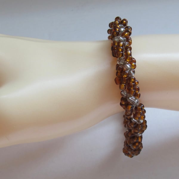 Slimline Bracelet: Amber Coloured & Clear Silver Lined Seed Beads, Spiral Weave