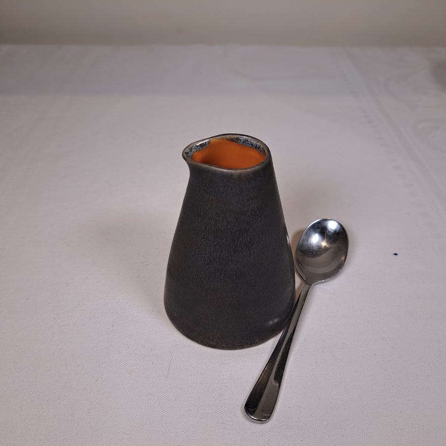 SMALL CERAMIC MILK, CREAM POURER - glazed in burnt orange and charcoal