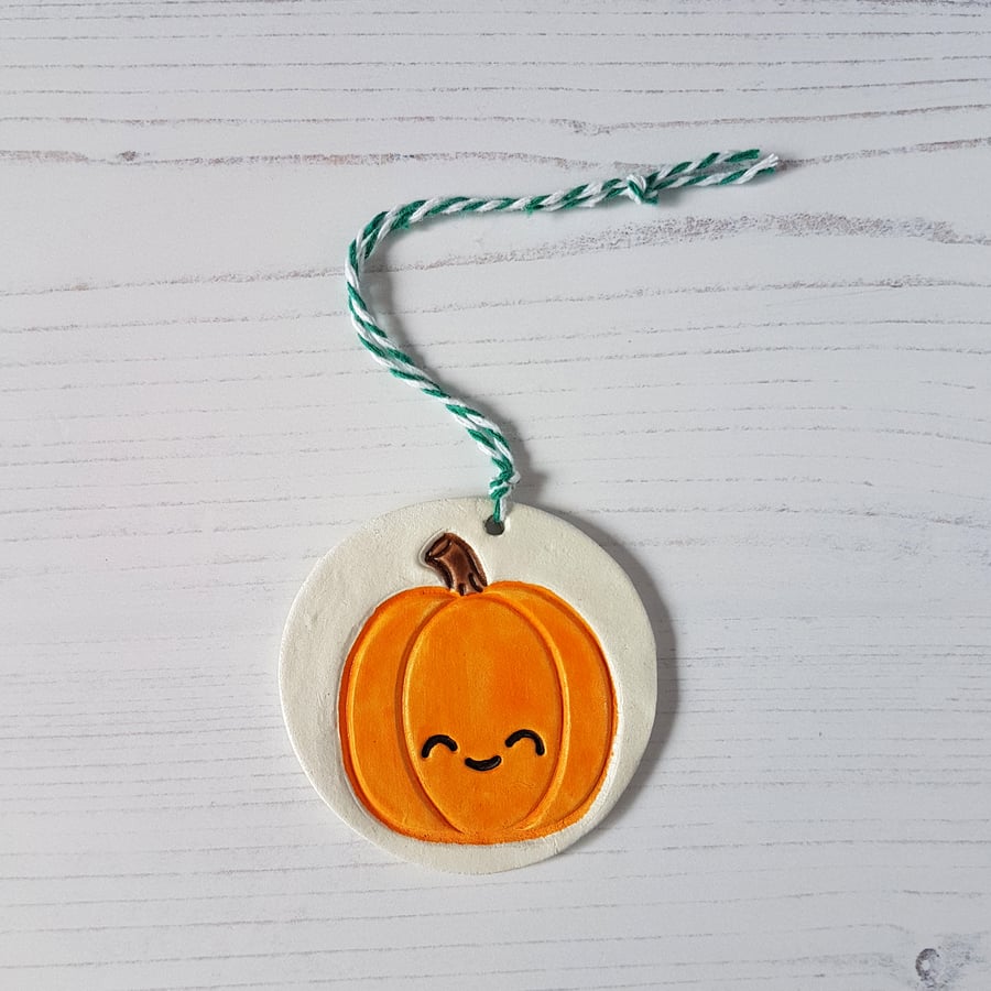Smiley Pumpkin hanging decoration, one supplied