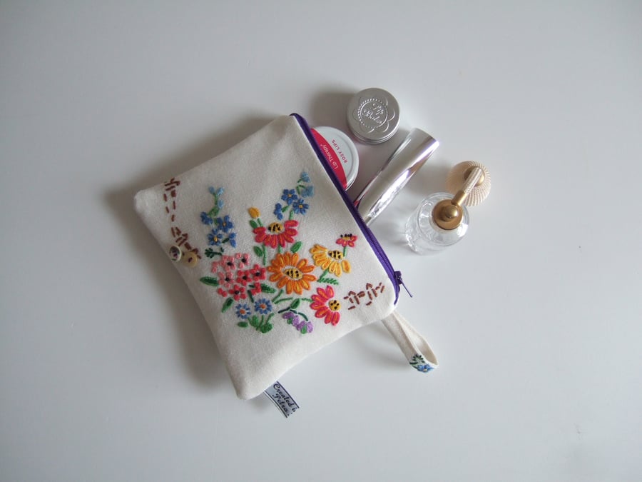 Make up bag or purse made from bright floral vintage embroidery