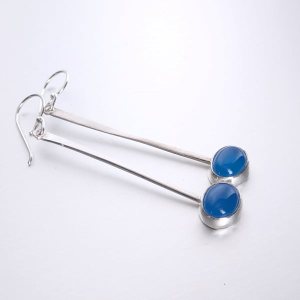 Eye catching long dangle blue onyx earrings