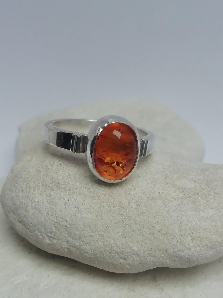 Amber and Silver Ring with Decoration