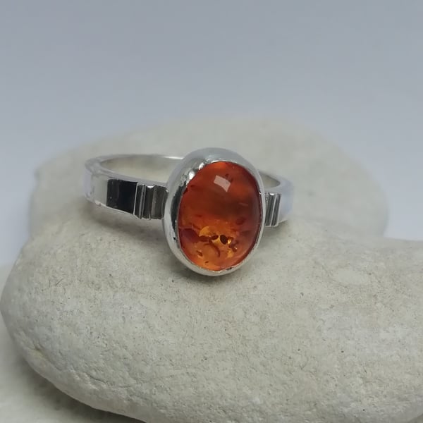 Amber and Silver Ring with Decoration