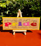 PRIDE wooden sign