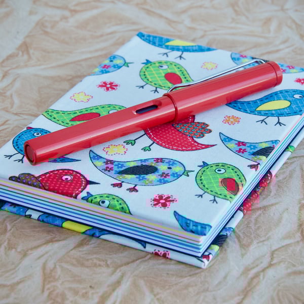 A6 Hardback notebook with full cloth bright bird cover
