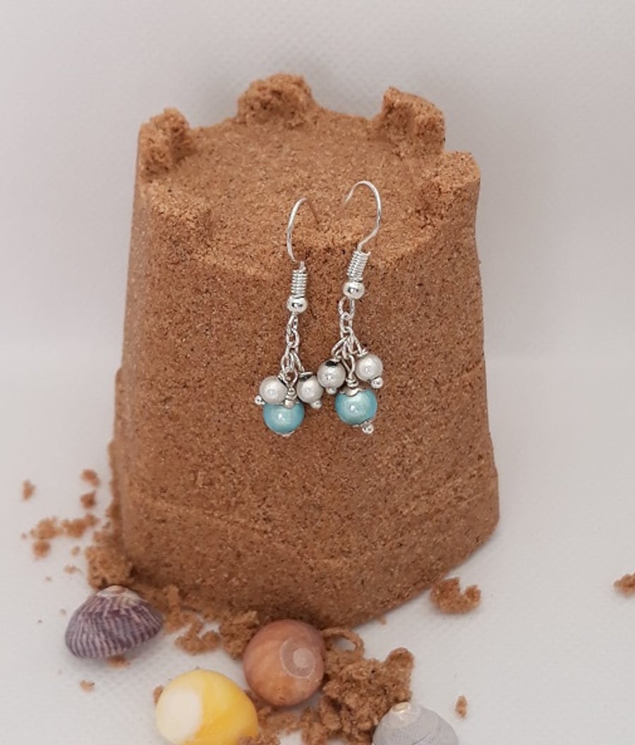 ER06 Pale blue and silver miracle bead drops