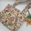 Tote bag, beige floral print with beading. 