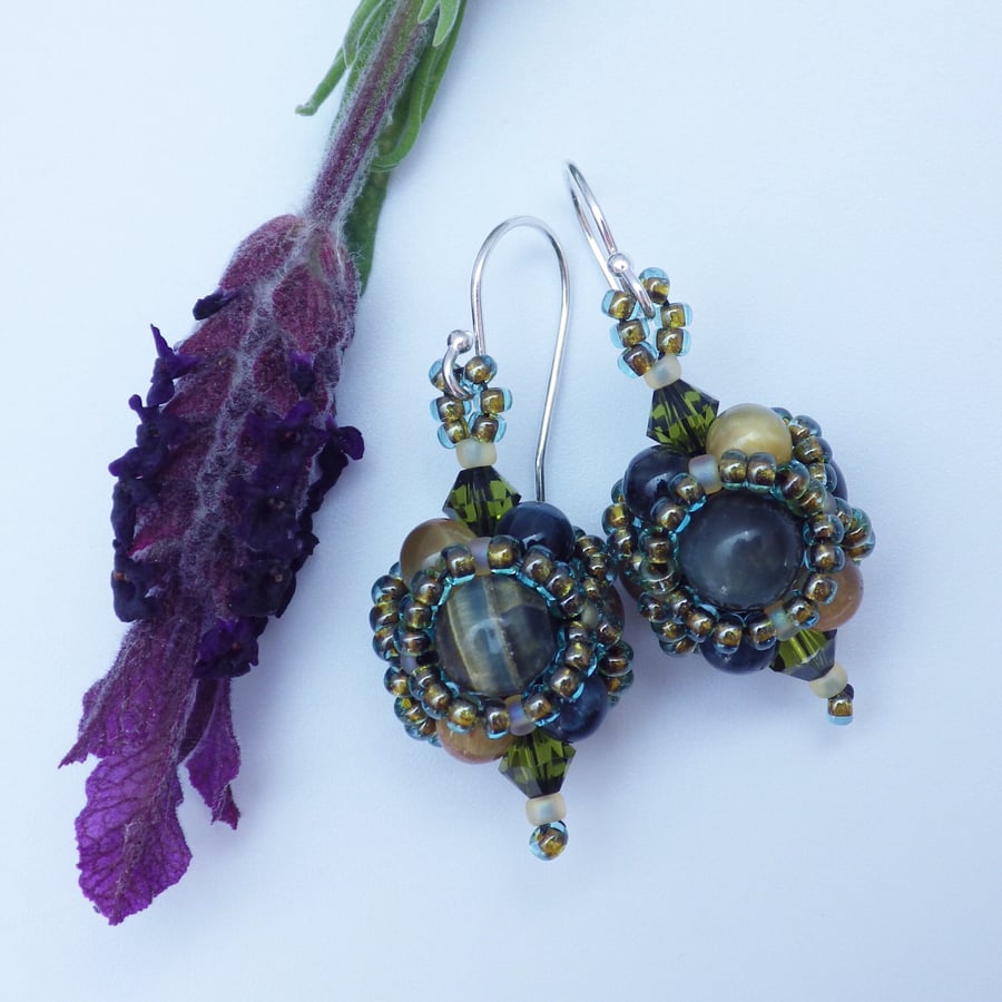 Netted beadwoven golden eye blue and Swarovski crystal earrings