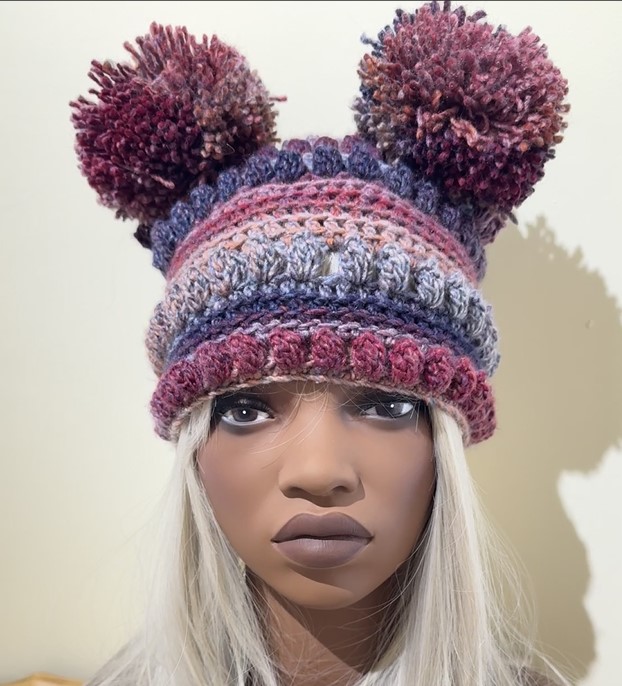 Funky Crochet Hat with double pom poms.   Soft heather colours. Stockingfiller.