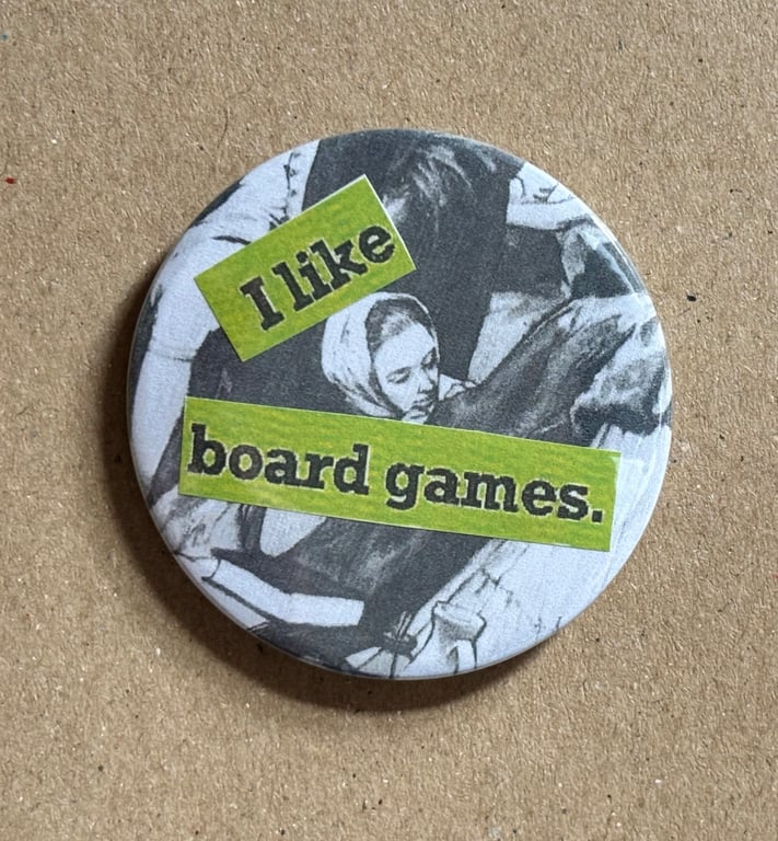 Collage pin badge - vintage book images & text - I like board games