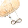 Antique silver infinity necklace with pretty star.