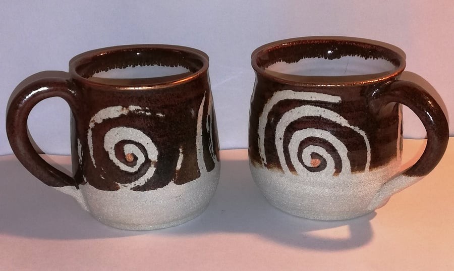Spiral decorated stoneware mugs...sale