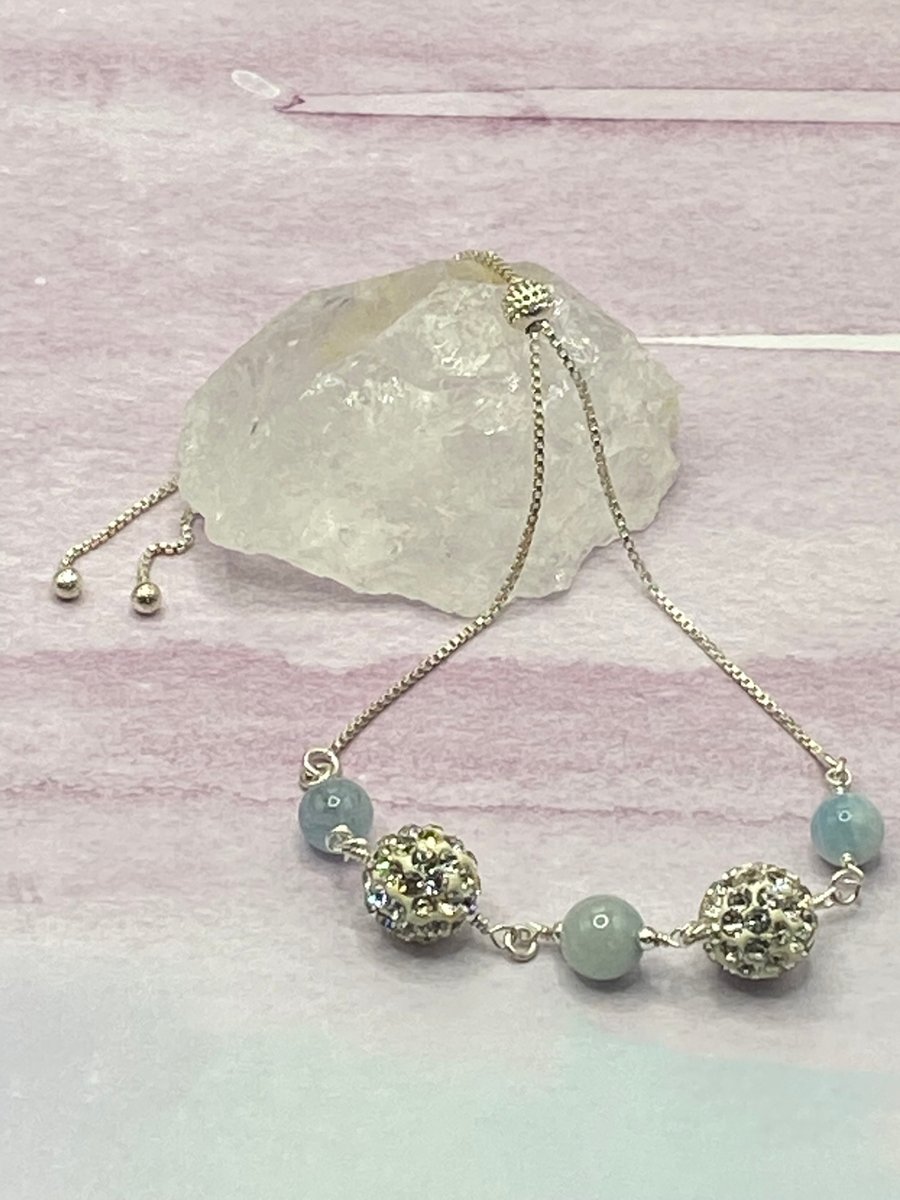 Silver plated slider bracelet with aquamarine stones and sparkly resin beads