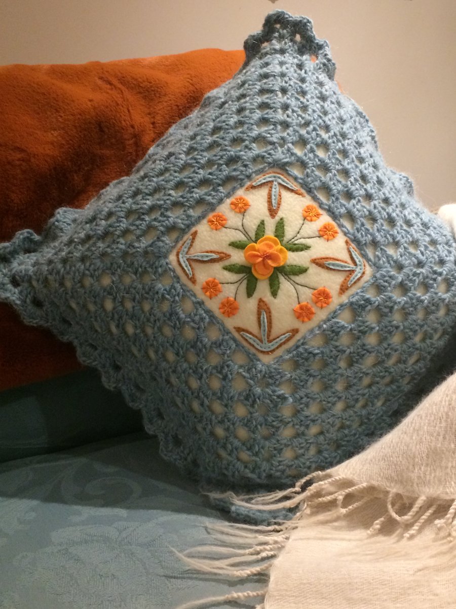 Crocheted yarn and felt applique square cushion