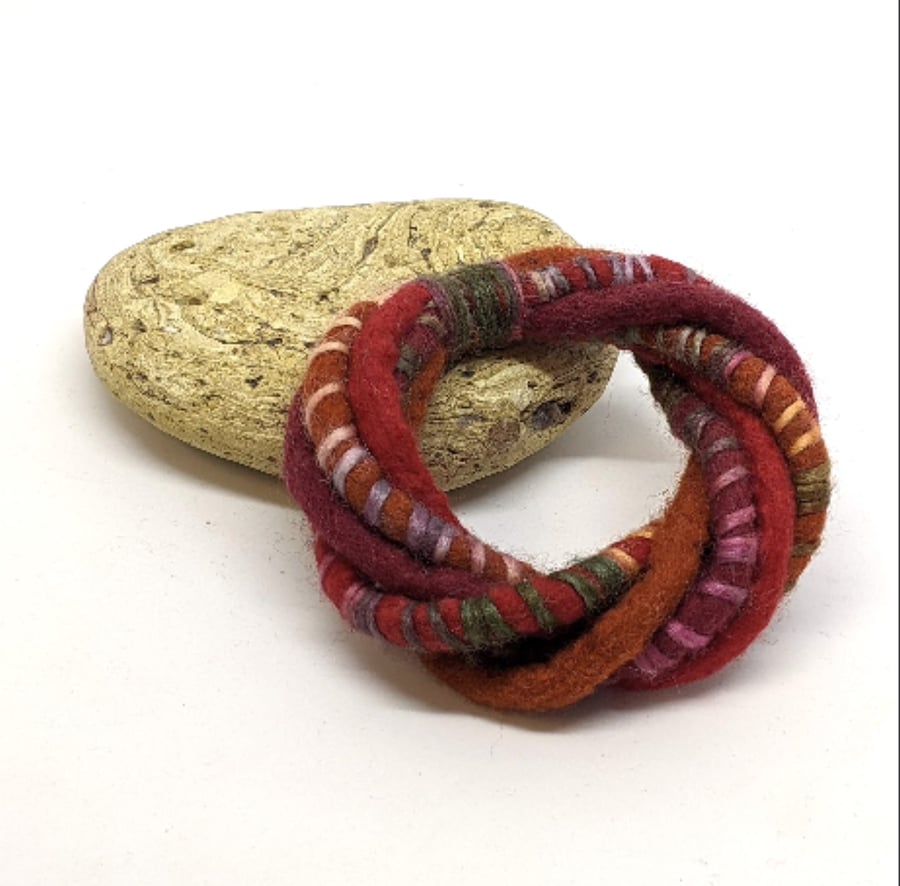 Felted merino cord bracelet in deep red, ruby and rust
