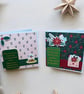 Set of two Christmas cards with Poinsettias and puddings. 
