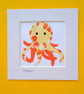An orange and white batik 'Octopus' fabric picture - 6x6 inches including mount