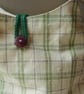 Crossbody pyramid shoulder bag in green and mauve checks - Image 2