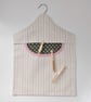 Peg bag in striped canvas fabric with dark green lining and red trim. - Image 5