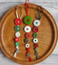 Set of Three Festive Button Dangle Christmas Tree Decorations - Image 1
