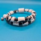 Memory wire black and white paper beaded bracelet
