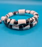 Memory wire black and white paper beaded bracelet - Image 1