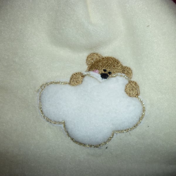 Hand made sewn baby hat in soft fleece fabric -cream with bear image