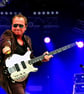 Mark King Level 42 In Concert Photograph Print - Image 1