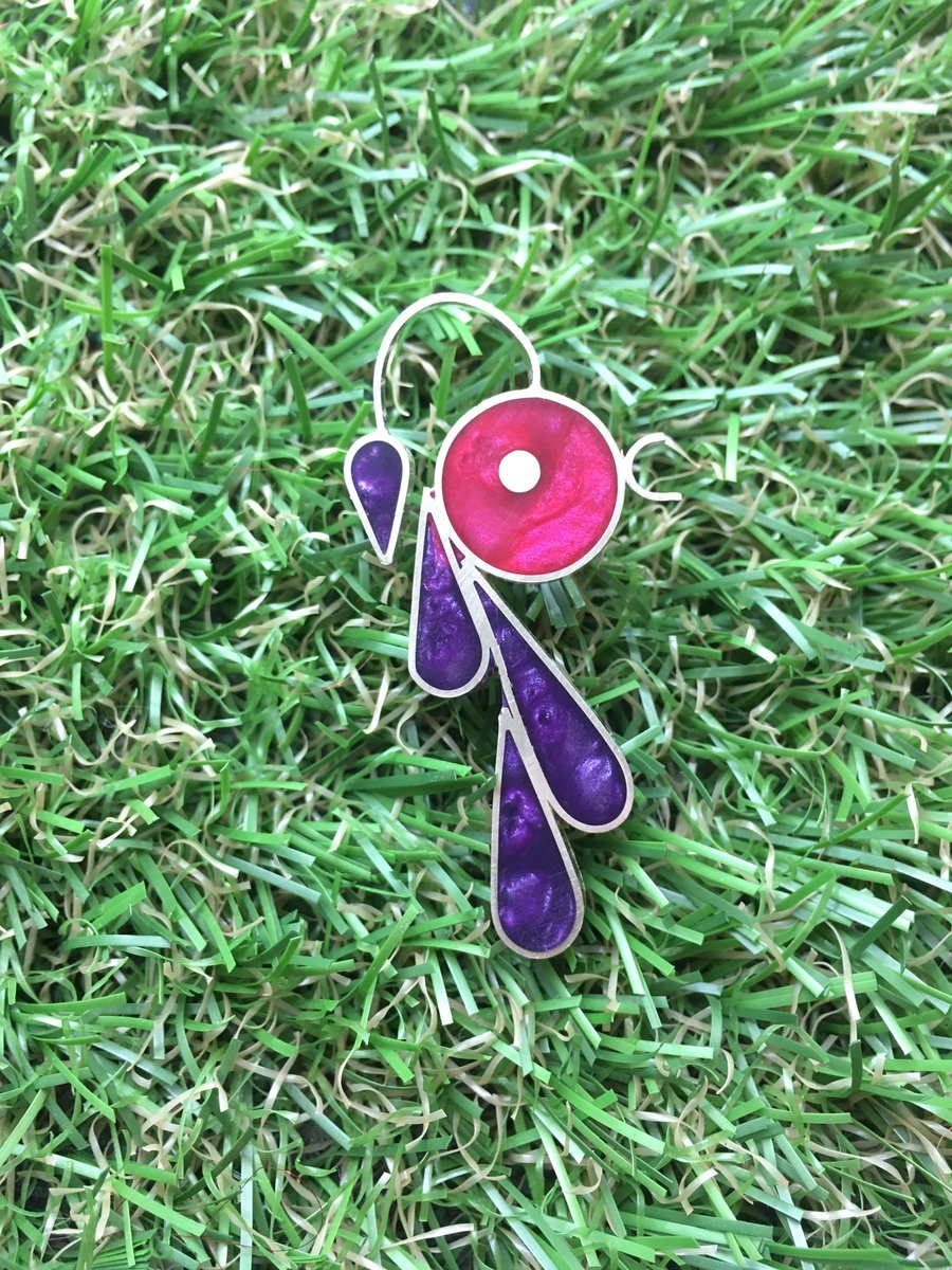 Sterling silver single bird filled with coloured resin. 