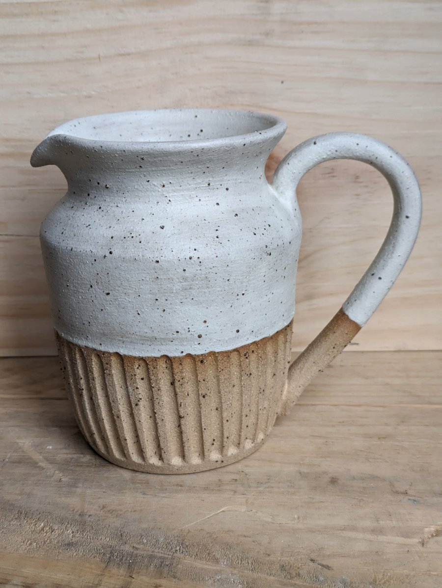 Larger matte cream carved jug (shoulder)