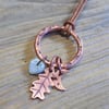 Chunky aged copper hoop 'moon and leaves' charm pendant 