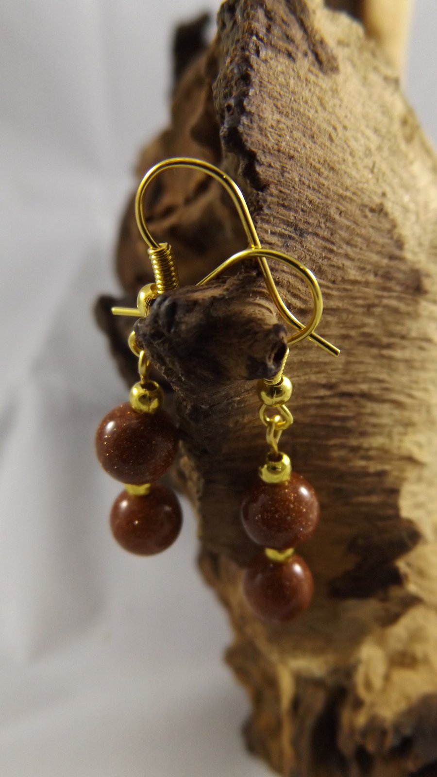 Goldstone round glitter earrings