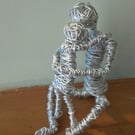 Figures made of wire ..Parent and child