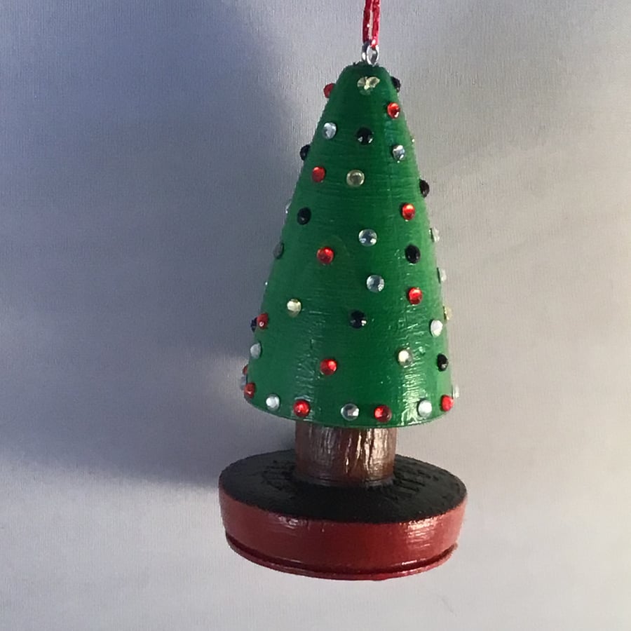 Decorative miniature hanging Christmas tree.