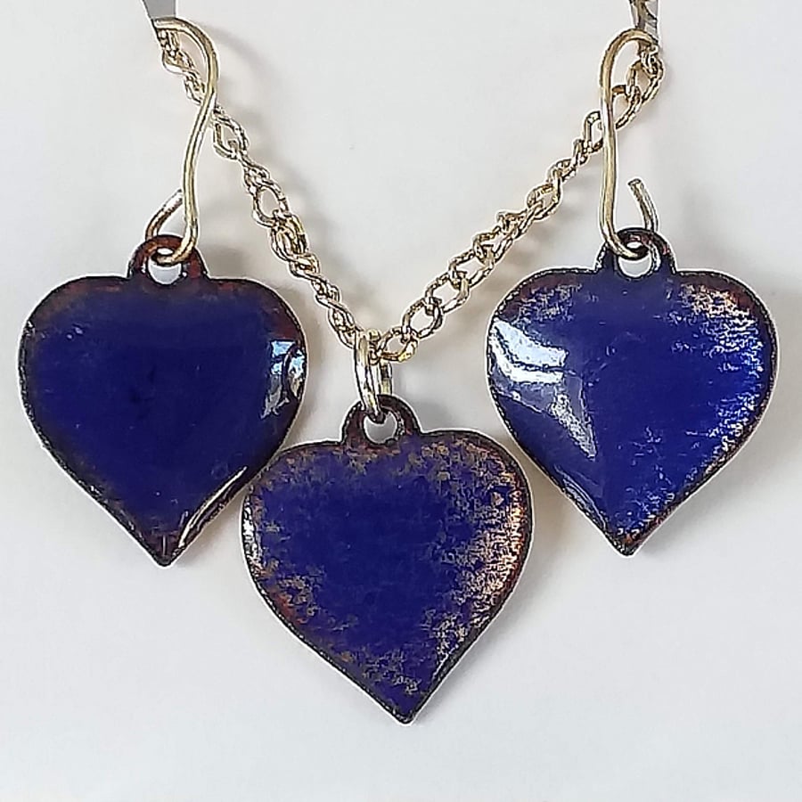 matched set of pendant and earrings in blue