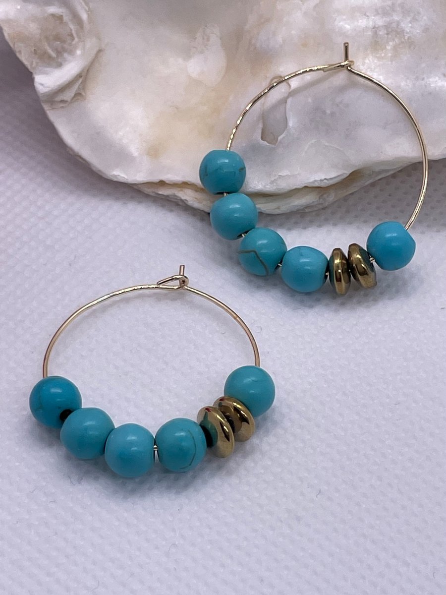Gold plated hoops with turquoise howlite beads