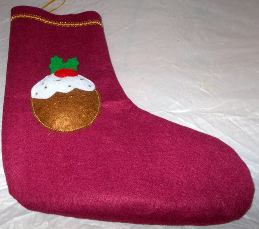 Hand made burgundy felt Christmas stockings with Christmas pudding