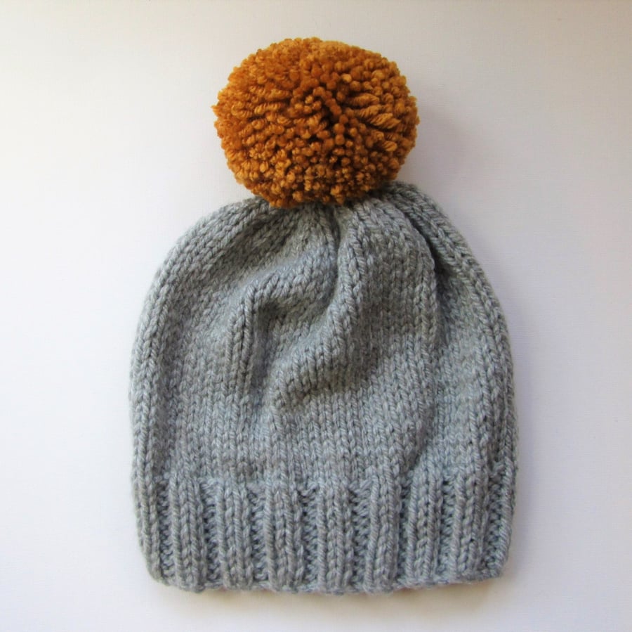 Bobble Hat in Light Grey Chunky Yarn with Mustard Pom Pom